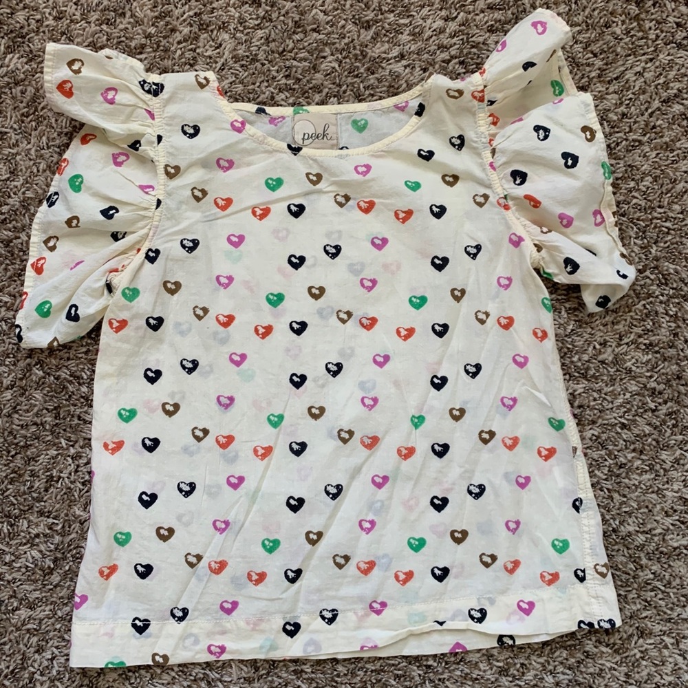 Peak flutter sleeve top